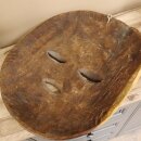 Maschere africane Utensili decorati con intagli