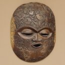 Maschere africane Utensili decorati con intagli