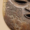 Maschere africane Utensili decorati con intagli