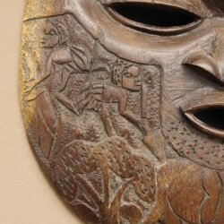 Maschere africane Utensili decorati con intagli