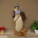 Taxidermied Wolpertinger marmot hiker with hat, backpack, neckerchief, walking stick, and pipe